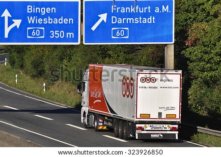 FRANKFURT,GERMANY-OCT 01:TNT delivery truck on the highway on October 01,2015 in Frankfurt,Germany.TNT is an international courier delivery services company with headquarters in Hoofddorp, Netherlands