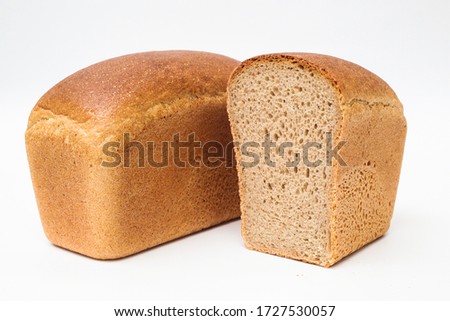 Similar – Image, Stock Photo Bread sliced in two held in womans hands. Sourdough bread