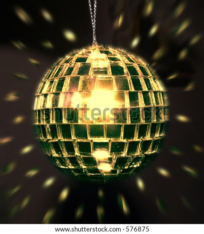 lit disco ball with light being cast around the room