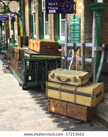 trolleys of cases and trunks at a railway station