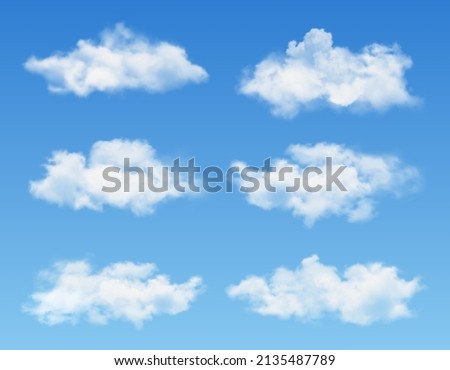 Realistic set of transparent different clouds isolated on blue background. Vector illustration