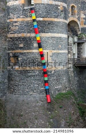 Colorful bins on the castle wall, Angers,  Maine-et-Loire department (France)