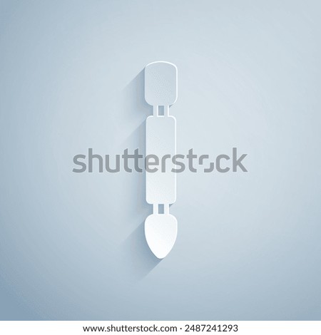 Paper cut Cuticle pusher icon isolated on grey background. Tool for manicure. Paper art style. Vector