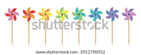 Pinwheels - colored pinwheel set, spinning toy with wooden stick. Isolated vector illustration on white background.
