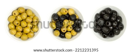 Image, Stock Photo Olives. A variety of green, black and red olives, with leaves, shot from the top with a place for text