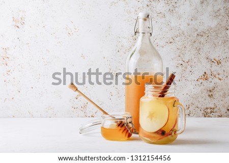 Similar – Image, Stock Photo Fermented lemons in jars of salt, chili pepper and rosemary. Probiotics Fermented food. Pickled lemons.