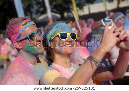 VANCOUVER, CANADA - SEPTEMBER 14, 2013: Thousands of runners took part in The Color Run 2013, known as the happiest 5km on the planet, in Vancouver, Canada, on September 14, 2013.