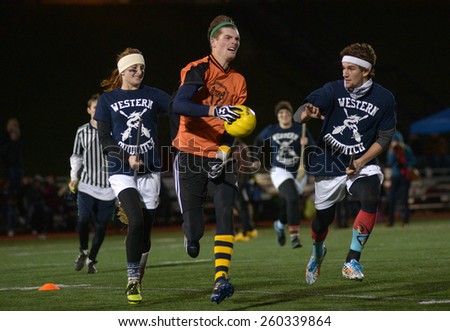 VANCOUVER, CANADA - NOVEMBER 22, 2014: University teams play quidditch, the game of Harry Potter books fame, at Simon Fraser University in Burnaby, BC, Canada, on November 22, 2014.