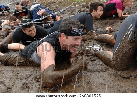 VANCOUVER, CANADA - JUNE 1, 2013: Competitors participate in the 2013 Spartan Race obstacle racing challenge in Vancouver, Canada, on June 1, 2013.