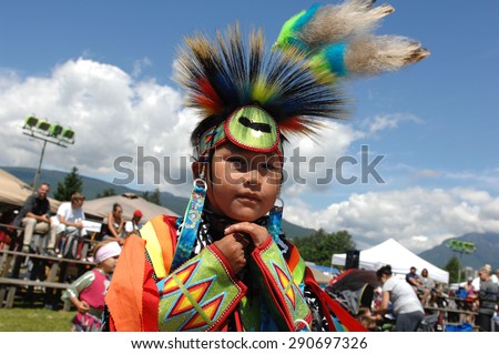 WEST VANCOUVER, CANADA - JULY 8, 2012: Native Indian people participate in the annual Squamish Nation Pow Wow in West Vancouver, British Columbia, Canada, July 8, 2012.