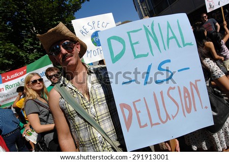 VANCOUVER, CANADA - SEP. 21, 2014: Thousands of people took part in the People\'s Climate March calling world leaders\' attention to global warming, Vancouver, Canada, on Sep. 21, 2014.
