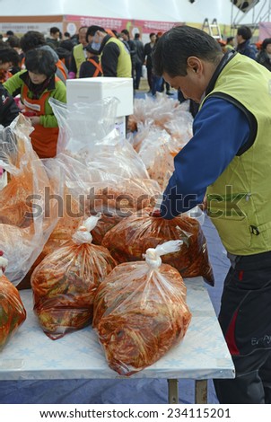 SEOUL - NOVEMBER 16, 2014. The recently held Kimchi Making & Sharing Festival involves the important Korean tradition of Gimjang, to ensure families have enough kimchi to get through the long winter.