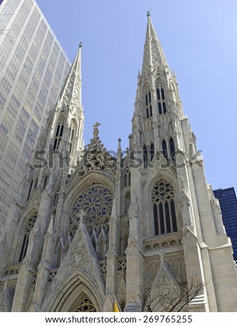 NEW YORK CITY - CIRCA APRIL 2015.  St. Patrick\'s Cathedral is a Roman Catholic Church, American landmark and tourist destination which crowds of people flock to on Fifth Avenue in Manhattan.