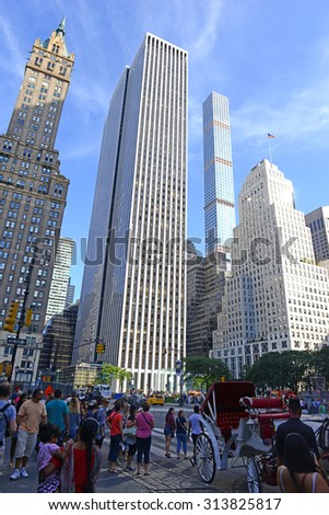 NEW YORK - CIRCA SEPTEMBER 2015. Several High Rise buildings in midtown Manhattan, illustrate the trend of high-end mixed use skyscrapers which combine both commercial and residential use.