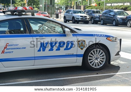 NEW YORK - CIRCA SEPTEMBER 2015. A hybrid NYPD patrol car on street, evidencing an increase in use of vehicles that make use of alternative fuels with the aim to help curb pollution in Manhattan.