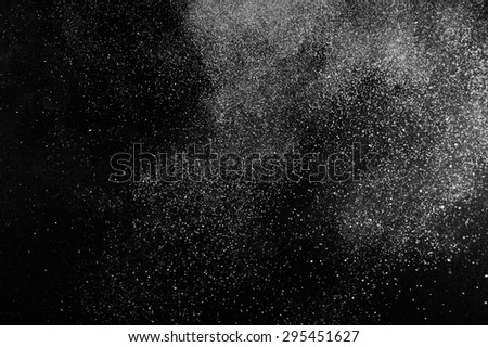 abstract white dust explosion  on black background. abstract white powder explosion  on black background