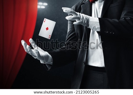 Magician hands showing magic trick 商業照片 © 