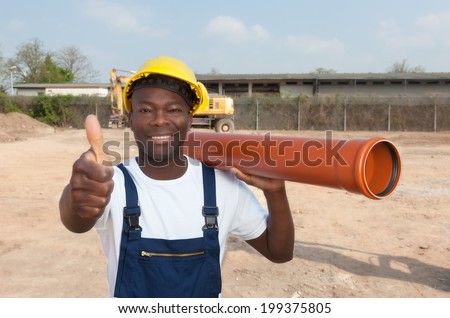 African construction worker with pipe showing thumb