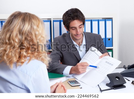 Businessman showing client details of the contract