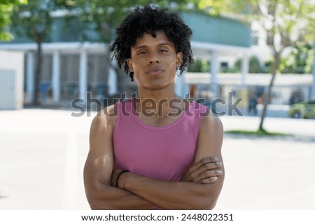 Similar – Image, Stock Photo Black serious sportive man using smartphone during workout