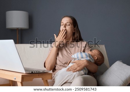 Similar – Image, Stock Photo Tired kid browsing laptop at home