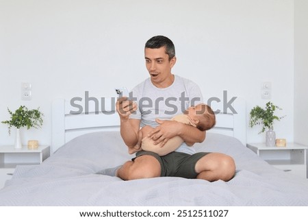 Similar – Image, Stock Photo Surprised newborn girl while relax in her hammock