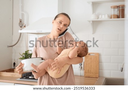 Similar – Image, Stock Photo Surprised newborn girl while relax in her hammock