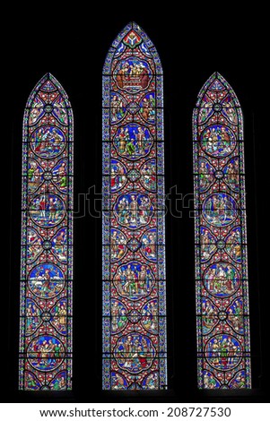 DUBLIN, IRELAND - JUNE 28, 2014: The Saint Patrick\'s window (St. Patrick\'s Cathedral), which tells the story of the life of Saint Patrick from his kidnapping from Wales to his death in Ireland.