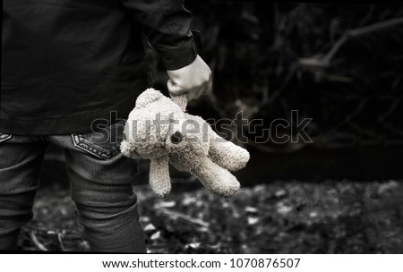 Similar – Foto Bild Junge hält sein Stofftier im Park