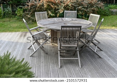 Similar – Image, Stock Photo set garden table with fairy lights in play of light and shadow