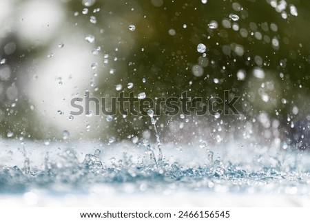 Similar – Image, Stock Photo white bubbling water fountain in front of blue sky