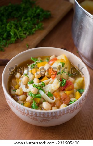 Healthy vegan soup with chickpeas, pasta, pumpkin and potato