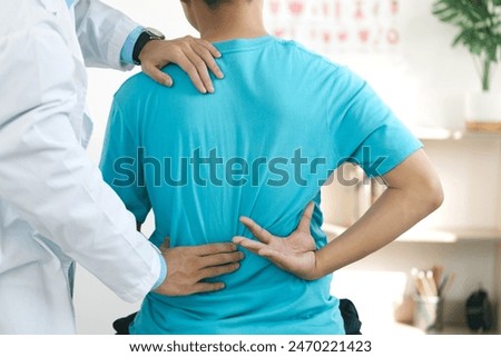 Image, Stock Photo rehabilitation therapy. Hands treating a young woman’s shoulder