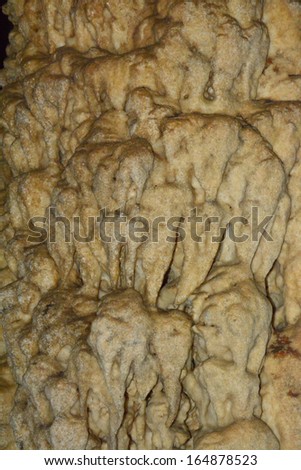 Limestone wall in a cave covered with dripstone ,Cheow Lan lake, Khao Sok National Park, Thailand