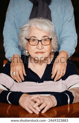 Similar – Foto Bild Oma zeigt ihrer Tochter Erinnerungen aus der Vergangenheit