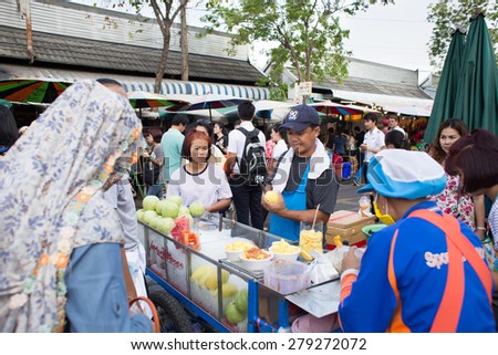 BANGKOK, THAILAND - MARCH 15 : Unidentified Thai fruit seller at Jatujak or Chatuchak Market on March 15, 2015 in Bangkok, Thailand. Jatujak Market is the largest market in Thailand.