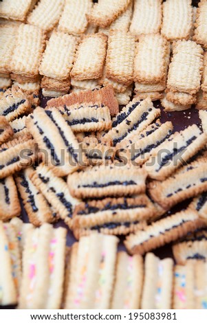 Variety of delicious freshly baked cookies cooling off