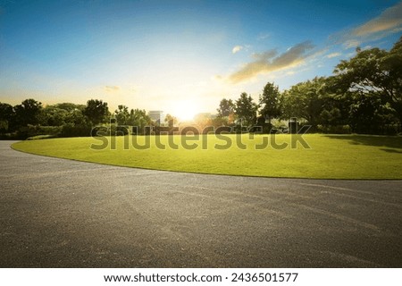 Similar – Foto Bild Sommerlicher Weg mit Gras und Bäumen sowie blauen Himmel lädt zum Spaziergang ein