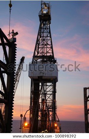 Jack Up Drilling Rig (Oil Rig) at Twilight Time