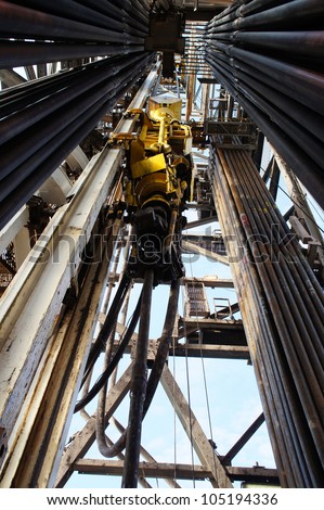 Top Drive System (Tds) Among Drillpipe Rack In Derrick Of Oil Drilling ...