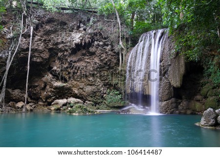Rock, waterfall and blue lake in the forest (Erawan Waterfall) in Thailand