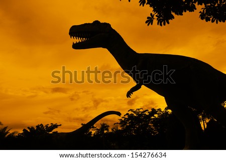 the silhouettes of dinosaurs