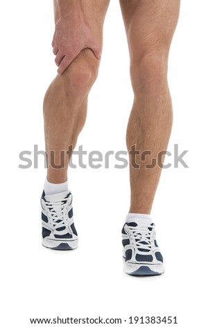 Knee Pain. A male jogger with sudden knee-pain.