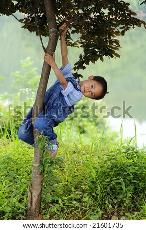 A 6 year old Chinese boy photographed around the countryside in Sankou, Anhui Province, East China.