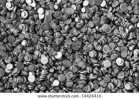 cool background with little, silver colored, round metal pieces