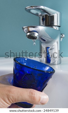 drop of water coming out of tap. Running out of water?