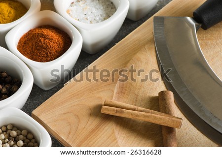 cutting knife with pots of spices. gourmet exotic food.
