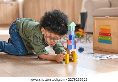 Similar – Image, Stock Photo Little kid playing with constructor game