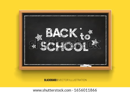 Back to school. Chalk inscription on a blackboard. Chalkboard 3D. Realistic black boards in a wooden frame isolated on a yellow background. Background for school