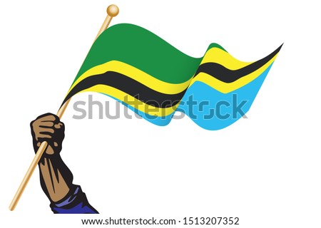 The hand holding the Tanzania flag.